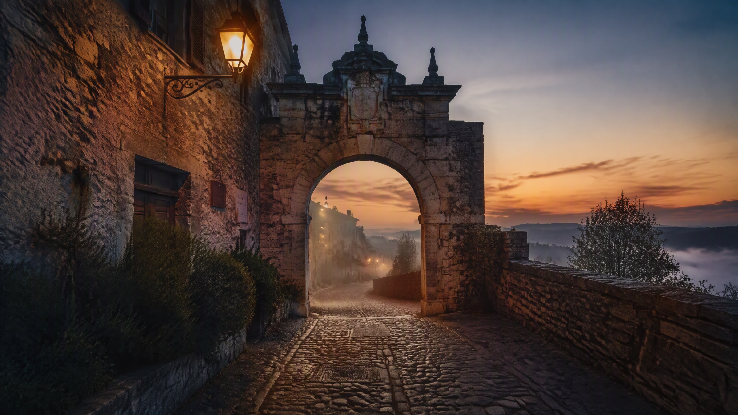 Šmartno stone gateway at dawn, lantern still lit