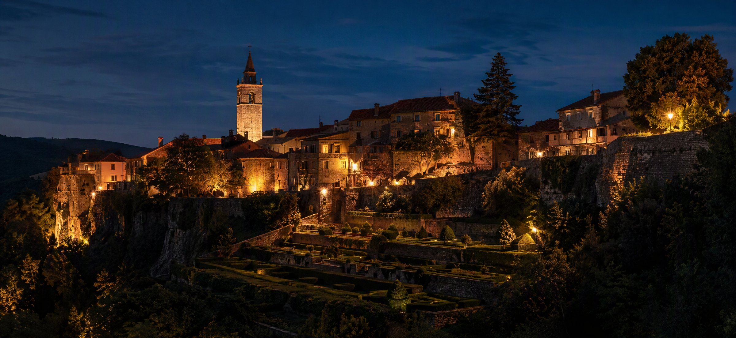 Stone village of Štanjel illuminated at blue hour on the Karst plateau