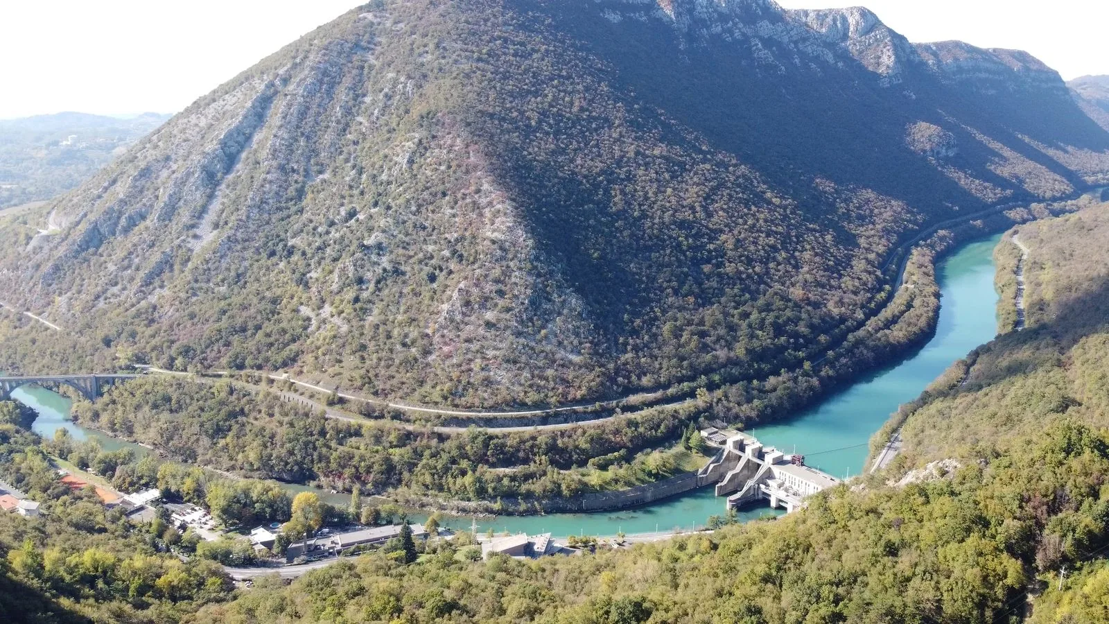 Aerial view of Mount Sabotin above the emerald Soča river near Nova Gorica