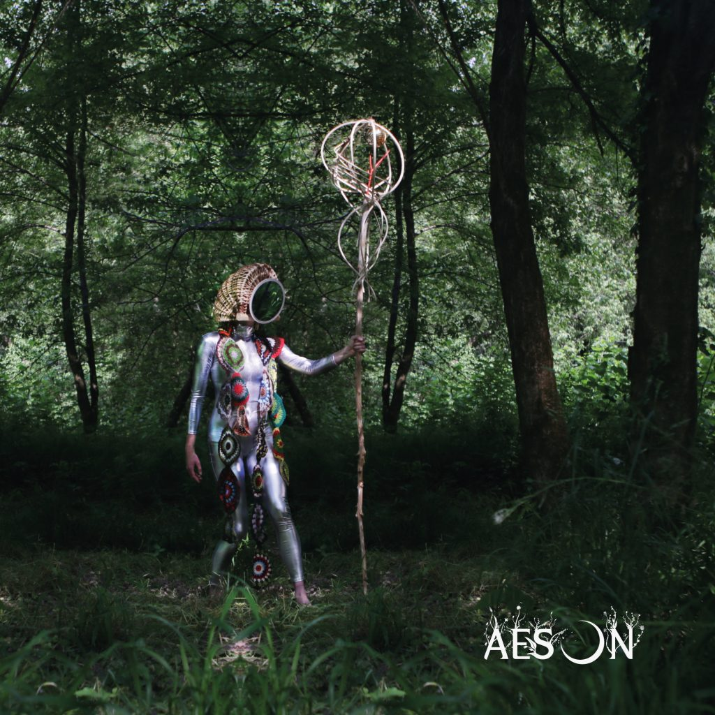 AESON land art performer in the forest
