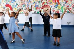 Participants in a flamenco dance workshop