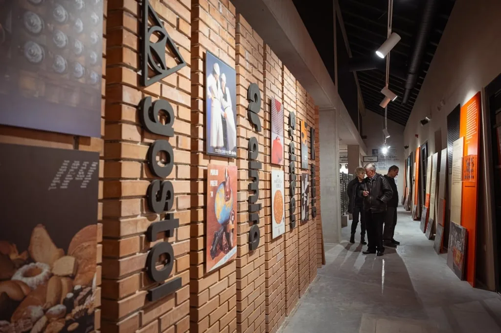 EPIC Exhibition brick wall with historical posters