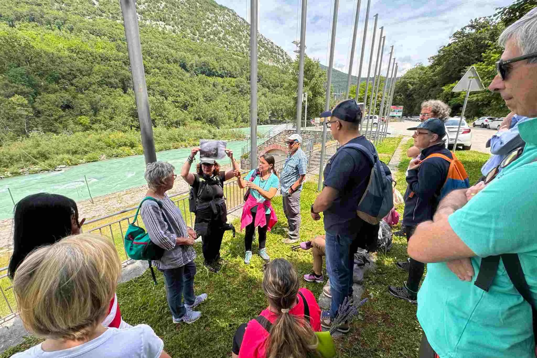Crossroads of Europe guided tour group by the Soča River
