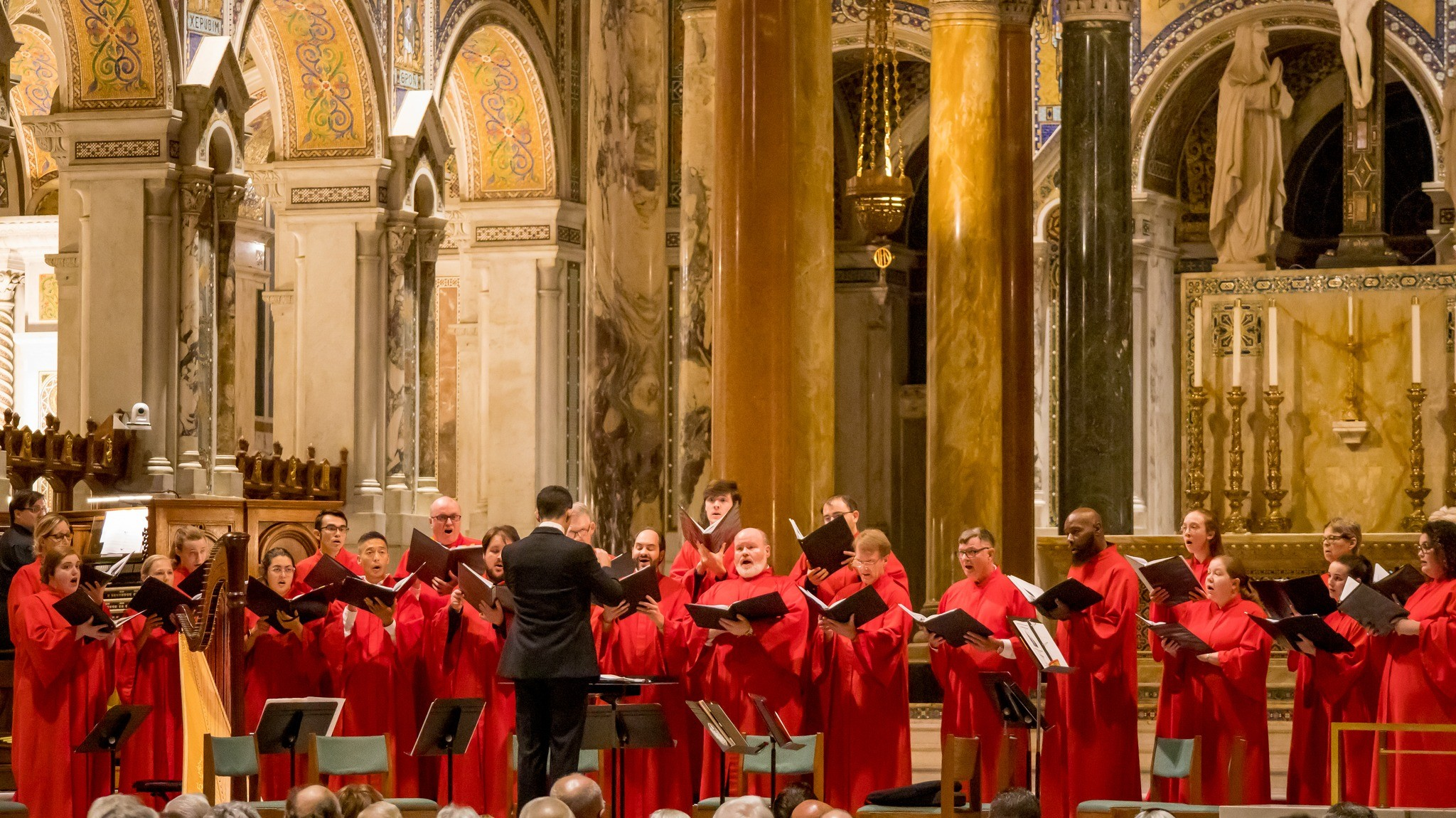 A choir performing sacred music in a basilica