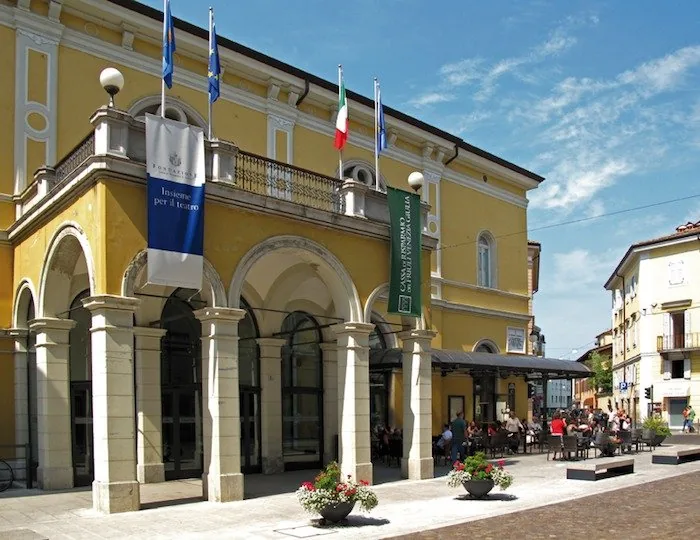 Teatro Verdi Gorizia exterior with banners