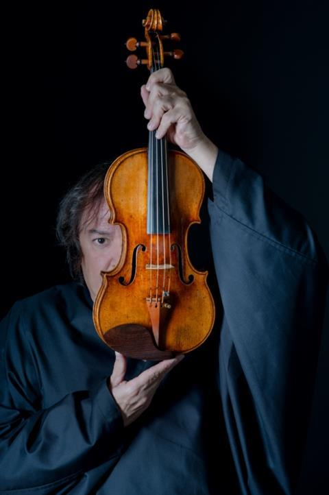 Sergej Krylov with his Stradivari violin