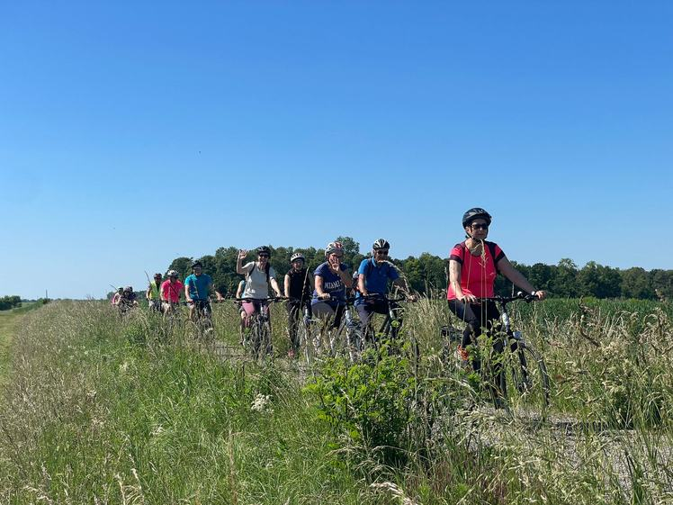 Cycling group enjoying a guided tour through the scenic countryside